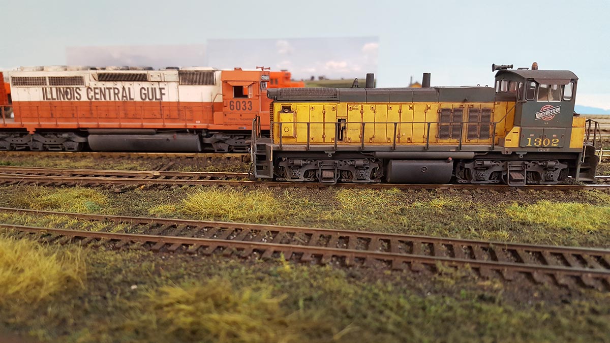 ICG 6033 and CNW 1302 at rest in Freeport Wallace Engine Terminal