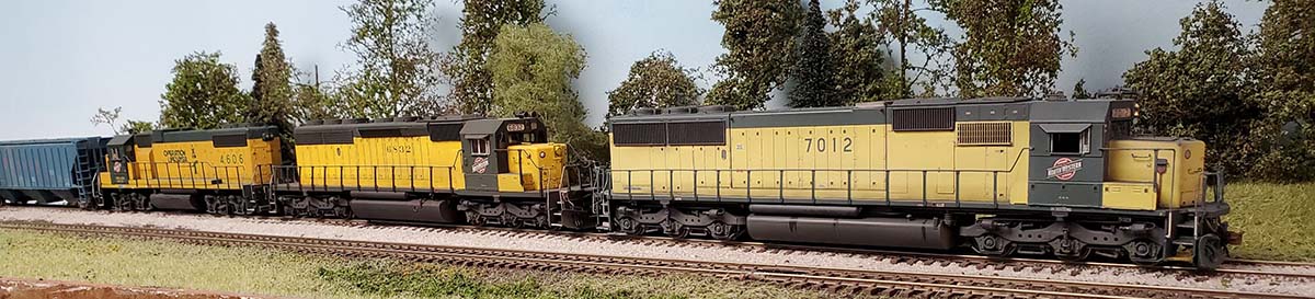 North Platte to Chicago C&NW manifest (NPCH1) led by SD50 7012 approaches Freeport Wallace Yard