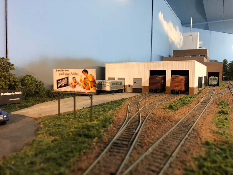 Paper being loaded for delivery by rail to Milwaukee, WI